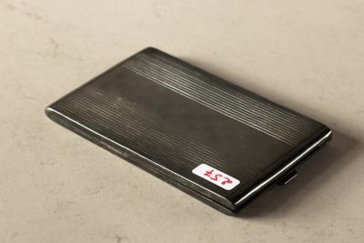 an image of a black business card case on a table