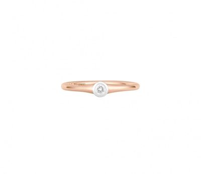 a white diamond ring on a white background