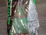 a bag of socks and a pair of gloves on a table