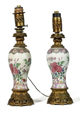 pair of chinese vases with flowers and birds on them on a white background