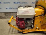 an image of a small engine on a cart