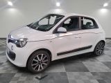 a picture of a white smart car in a showroom