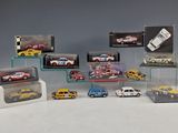 a lot of toy cars that are in a display case