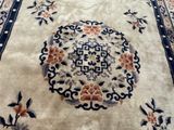 a large oriental rug on the floor in a room