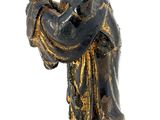 a statue of a woman holding a bird in her hands