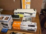 many different types of electronics on the table