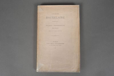 a close up of a book on a table with a gray background