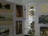 an open book with pictures of people on it