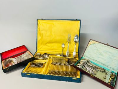 a lot of silverware in a case on the table