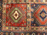 an image of a rug with many different colors and patterns
