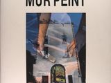 an image of a book with a picture of a person painting a building