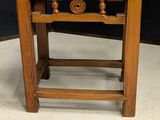 an image of a small wooden table with a drawer underneath it