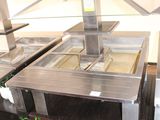 an image of a buffet with a lot of food on it