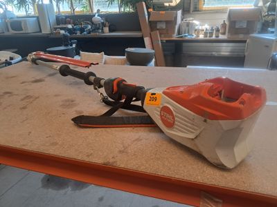 a corded blower sitting on a counter in a kitchen