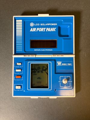 un appareil électronique bleu posé sur une table