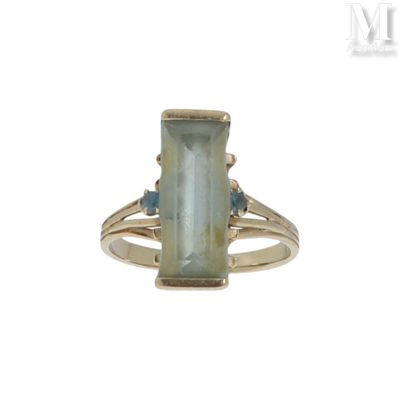 une image représentant une bague sertie d'une pierre verte