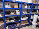 a room filled with lots of boxes and shelves