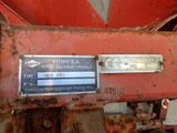 a close up of a sign on the side of a tractor
