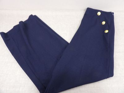 a close up of a pair of blue pants on a white surface