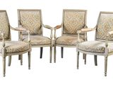 lot de quatre chaises rembourrées avec accoudoirs rembourrés