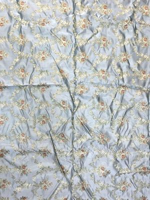 a close up of a piece of fabric with flowers on it