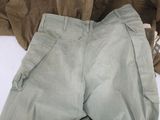 a pair of pants that are laying on the ground