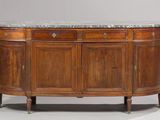 an antique wooden sideboard with marble top and two drawers