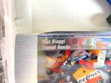a box full of assorted toy cars on a table