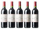 six bottles of red wine are lined up in a row