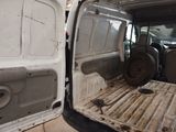a white van with a flat bed in the back