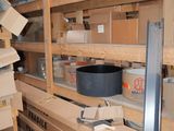 many boxes and boxes on the shelves in the room