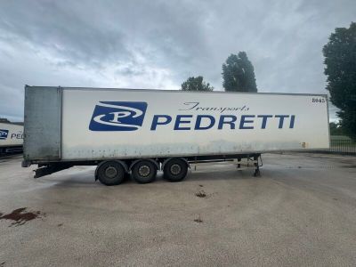a semi truck that is parked in a parking lot
