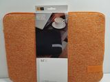 an orange laptop case sitting on top of a white table