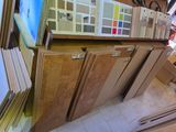 a lot of cabinets that have different colors on them