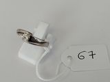 a close up of a ring with a price tag attached to it