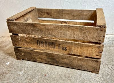 a wooden crate that is sitting on the floor