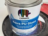 a can of aqua pu gloss sitting on top of a bucket