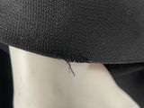 a black hat on a mannequin head on a mannequin