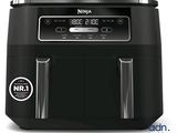 an image of a black and silver air fryer sitting on top of a counter