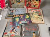 a lot of books that are on a table