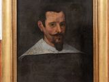 a painting of a man with a beard in a gold frame