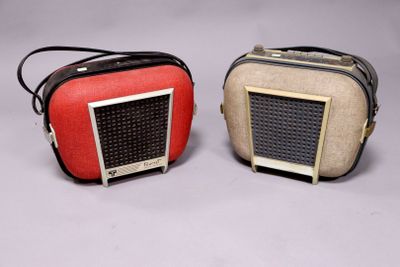 pair of vintage radio ' s on a white background
