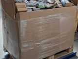 a pallet full of boxes of assorted items in a warehouse