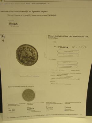 un morceau de papier sur lequel est représentée une pièce de monnaie