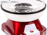 an image of a red and white gumper machine