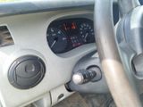 a close up of a car dashboard with a steering wheel