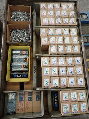 many boxes of assorted items sitting on the floor