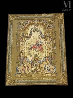 a close up of a tapestry hanging on a wall