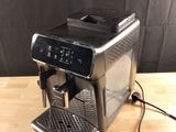 an image of a coffee machine on a wooden table