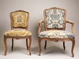 pair of louis xv style armchairs with upholstered upholstered cushions